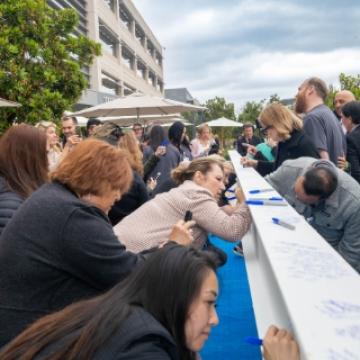 Building Hope: Hospital beam-signing marks a milestone for City of Hope Orange County