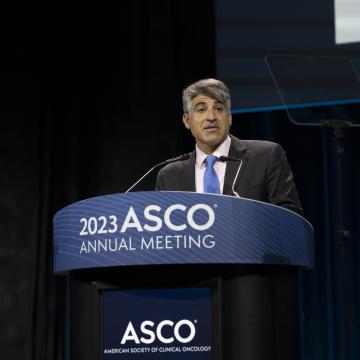Alex Herrera making a speech at ASCO 2023