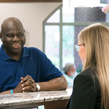A patient checking in at City of Hope Cancer Center Atlanta