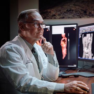 Interventional radiologist Henry Krebs, M.D., reviews images at City of Hope Atlanta