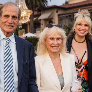 Norman and Melinda Payson are pictured alongside their daughter and her husband, Devon and Randy Wilson, at the City of Hope “Promises of Hope” fundraiser. Credit: Chris Laxamana for City of Hope