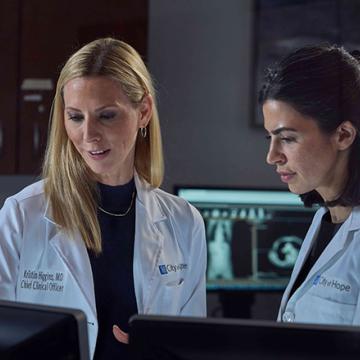 Dr. Higgins working with a colleague