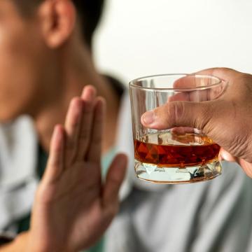 image of a man declining a drink