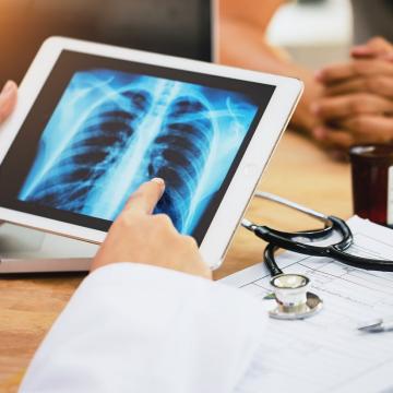image of a chest x-ray being reviewed on a hand held viewer