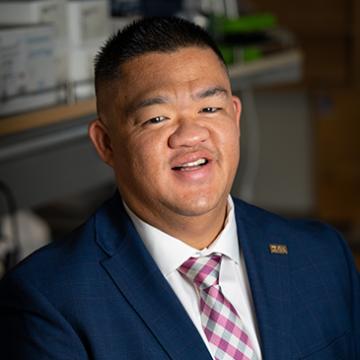 Portrait photo of Alex Wong.