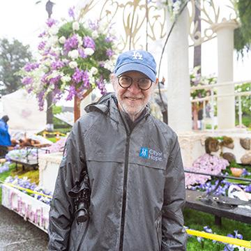 Rose Parade 2026 - Stephen Forman, M.D. in front of the Rose Parade Float