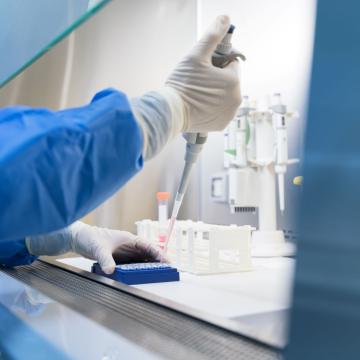 Lab technician taking specimen sample