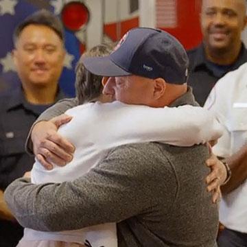 BMT donor and recipient embracing