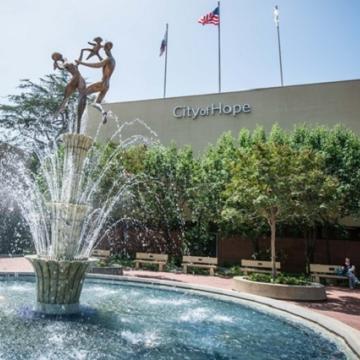 The Spirit of Life fountain on campus depicts two parents lifting a child with joy