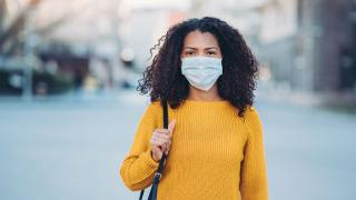 emotional-contagion-woman-alone-mask