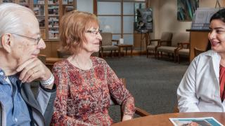 A couple sitting in the Biller center