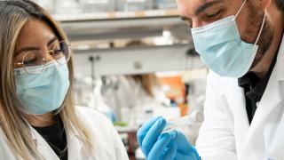 Two researchers in a lab