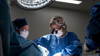 Doctor Wai-Yee performing an operation