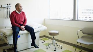 Black patient in hospital room