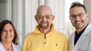 City of Hope patient Paul Edmonds with Dr. Dickter and Dr. Al Malki