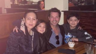 Stage 4 stomach cancer Camilla Row and her family having a good time in a restaurant
