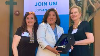 Gilanie De Castro receives the Elizabeth "Betty" Curtis Award for advocacy in legislature