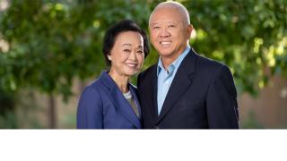 Peggy (right) and Andrew Cherng, co-founders and owners of Panda Express, standing side-by-side smiling after gifting City of Hope $100 million to Fund Pioneering Center for Integrative Oncology.