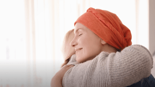 City of Hope patients hug one another