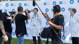 Doctors Ryotaro Nakamura and Eileen Smith taking interviews at BMT Reunion