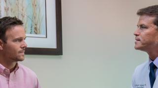 Doctor consulting patient