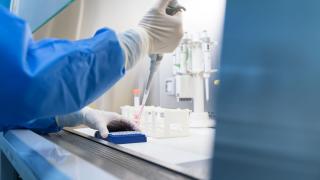 Lab technician taking specimen sample