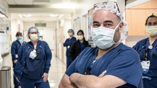 Masked doctors and nurses working together with a positive attitude 