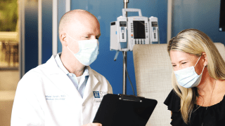 A patient getting answers from her oncologist