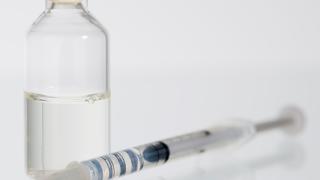 Syringe and insulin bottle