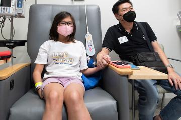 Patient sitting in a chair