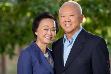 Peggy and Andrew Cherng, philanthropists, share a joyful moment following their transformative $100 million donation from the Panda Charitable Family Foundation.
