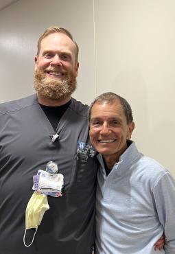Jim Madrid (right) with lead radiation therapist Art Bitner