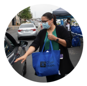 A person holding a produce bag